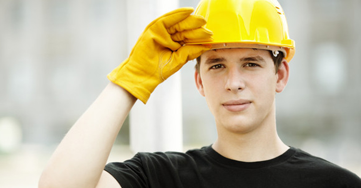 Young Male Worker Wearing Yellow Hard Hat